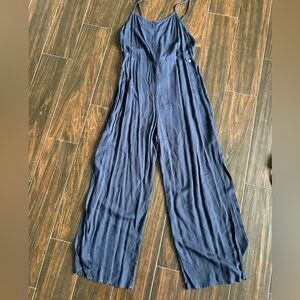 Navy Textured Wide-Leg Jumpsuit Adjustable Straps Pockets and Side Leg Slits